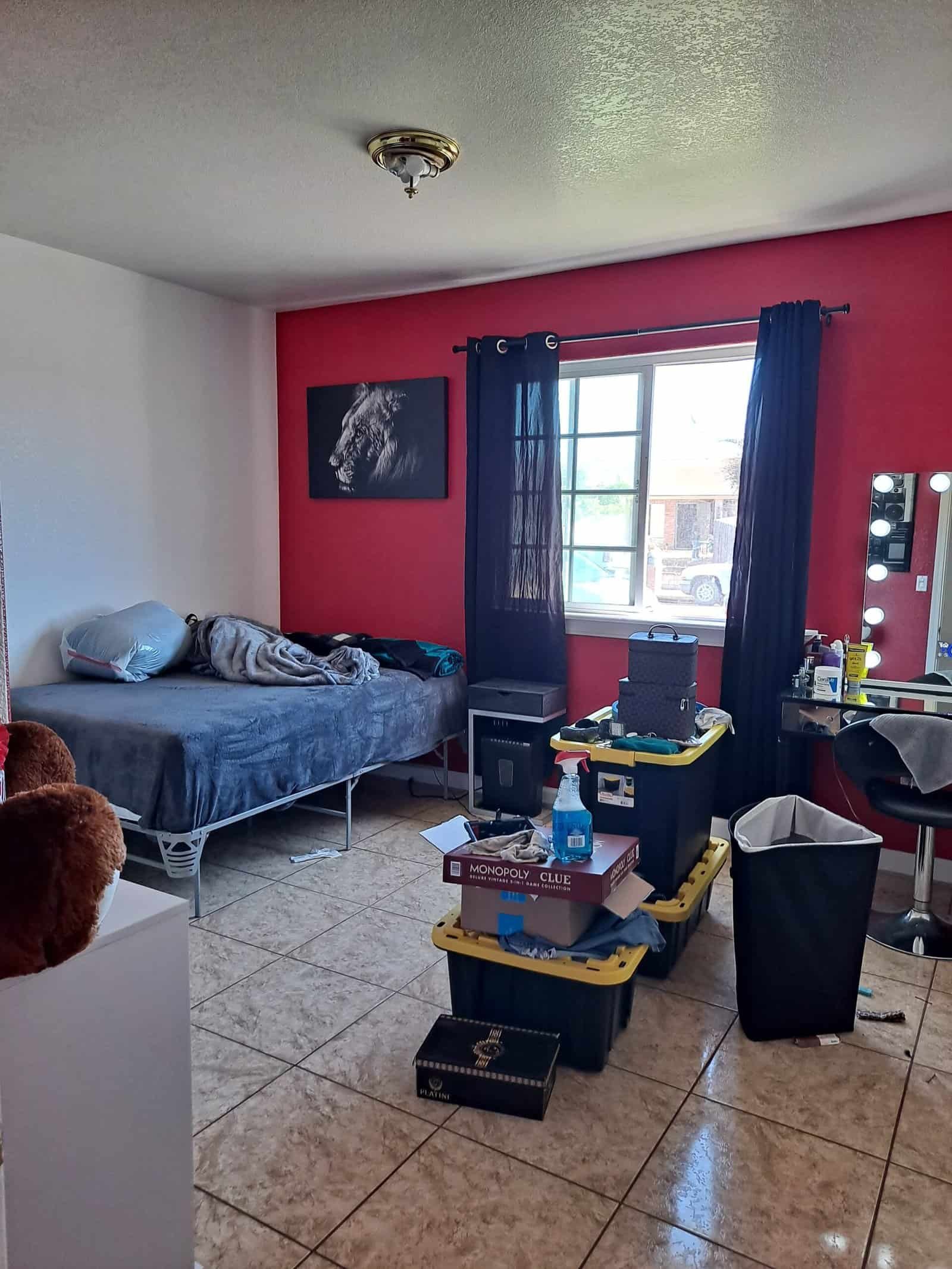 Bright red interior wall painted by CA TOP PAINTING, showcasing professional residential painting services.